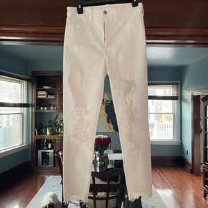 Lightly used womens ripped white jeans